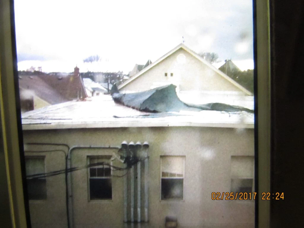 Roof Abandons Apartments During Storm